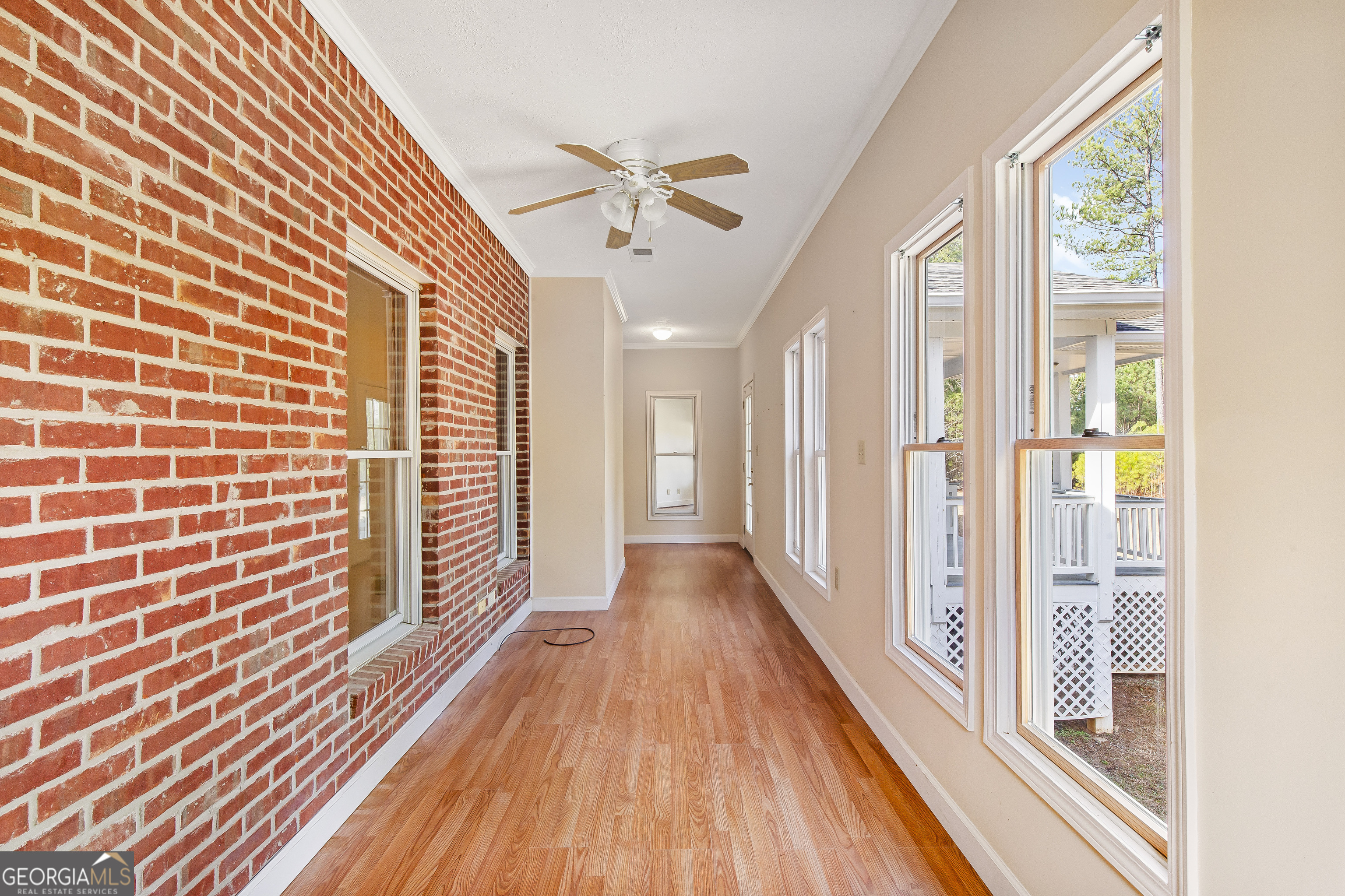 273 High Point Road Buchanan, GA 30113 - Photo 27 of 73 a view of a hallway with wooden floor and staircase