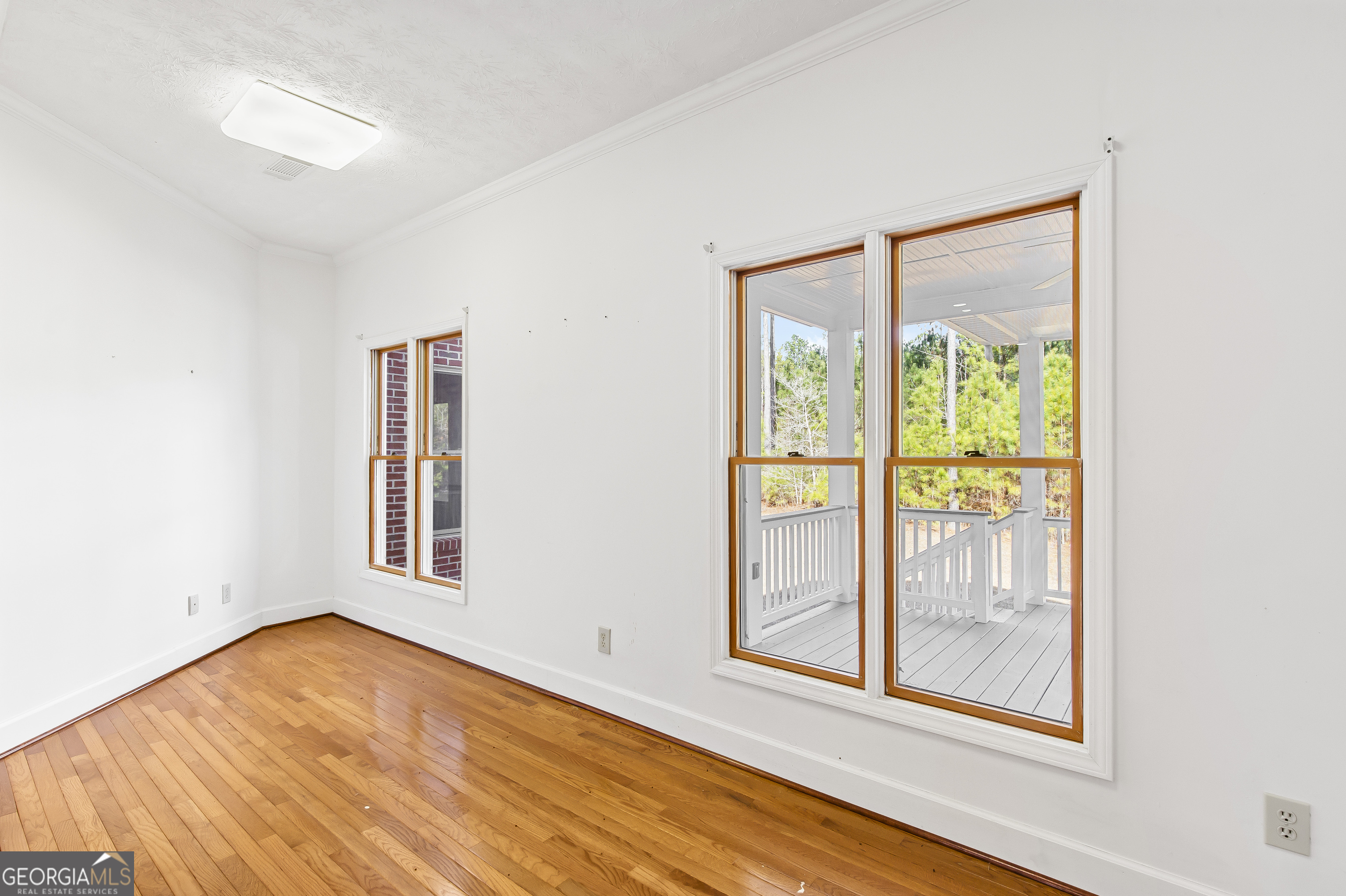273 High Point Road Buchanan, GA 30113 - Photo 30 of 73 a view of an empty room with glass door