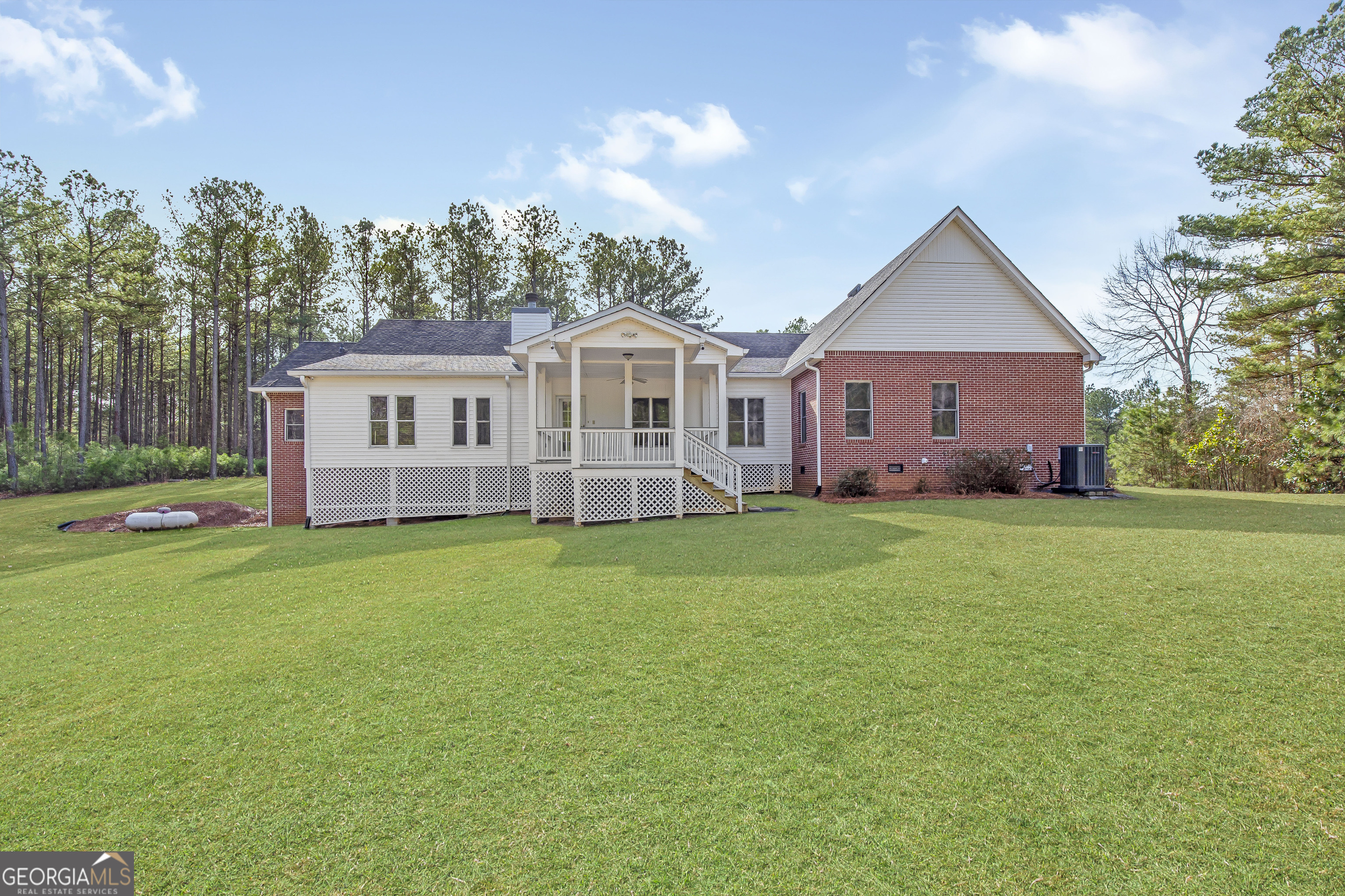 273 High Point Road Buchanan, GA 30113 - Photo 3 of 73 a front view of house with yard and green space