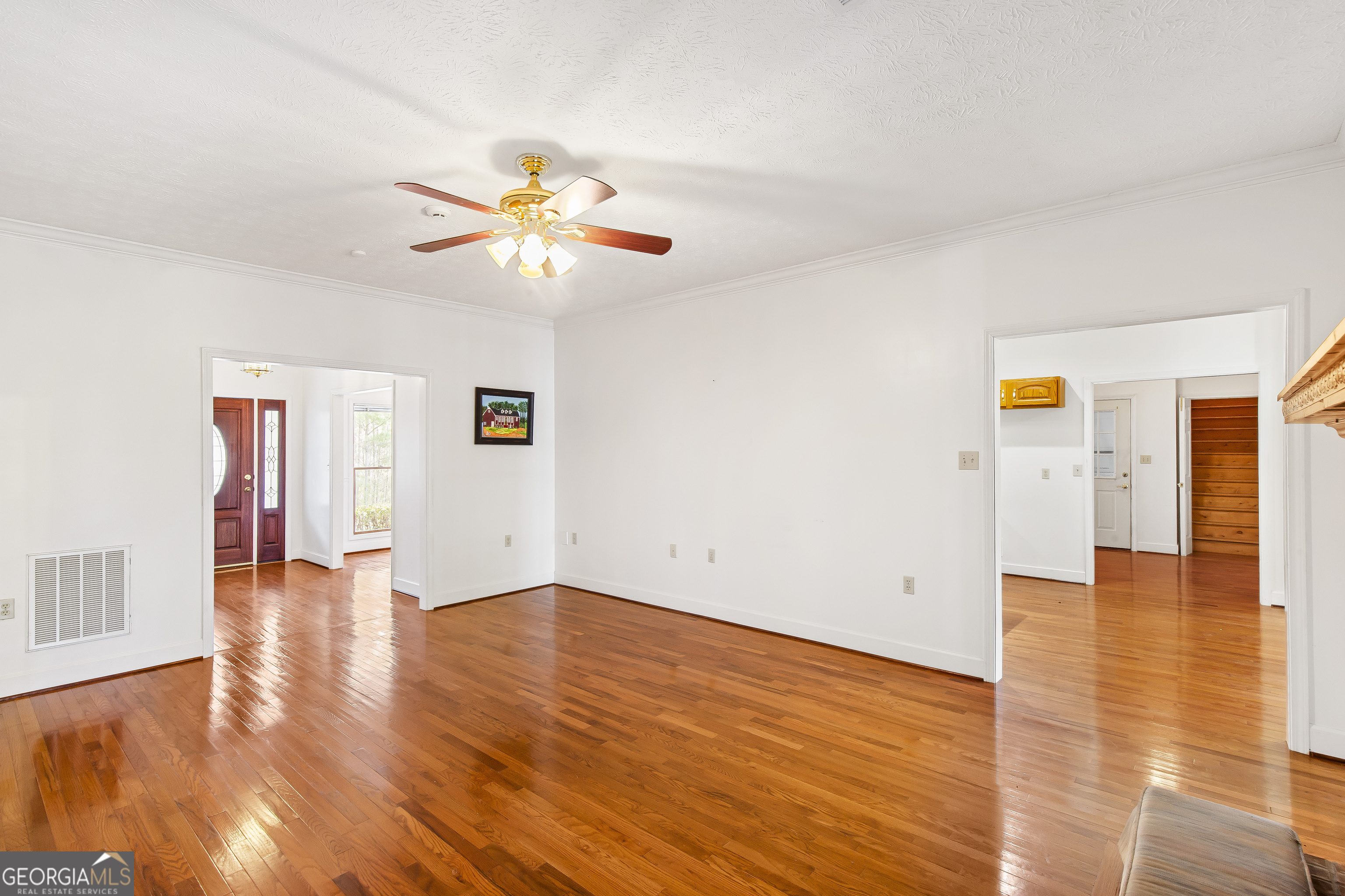273 High Point Road Buchanan, GA 30113 - Photo 33 of 73 a view of an empty room with wooden floor