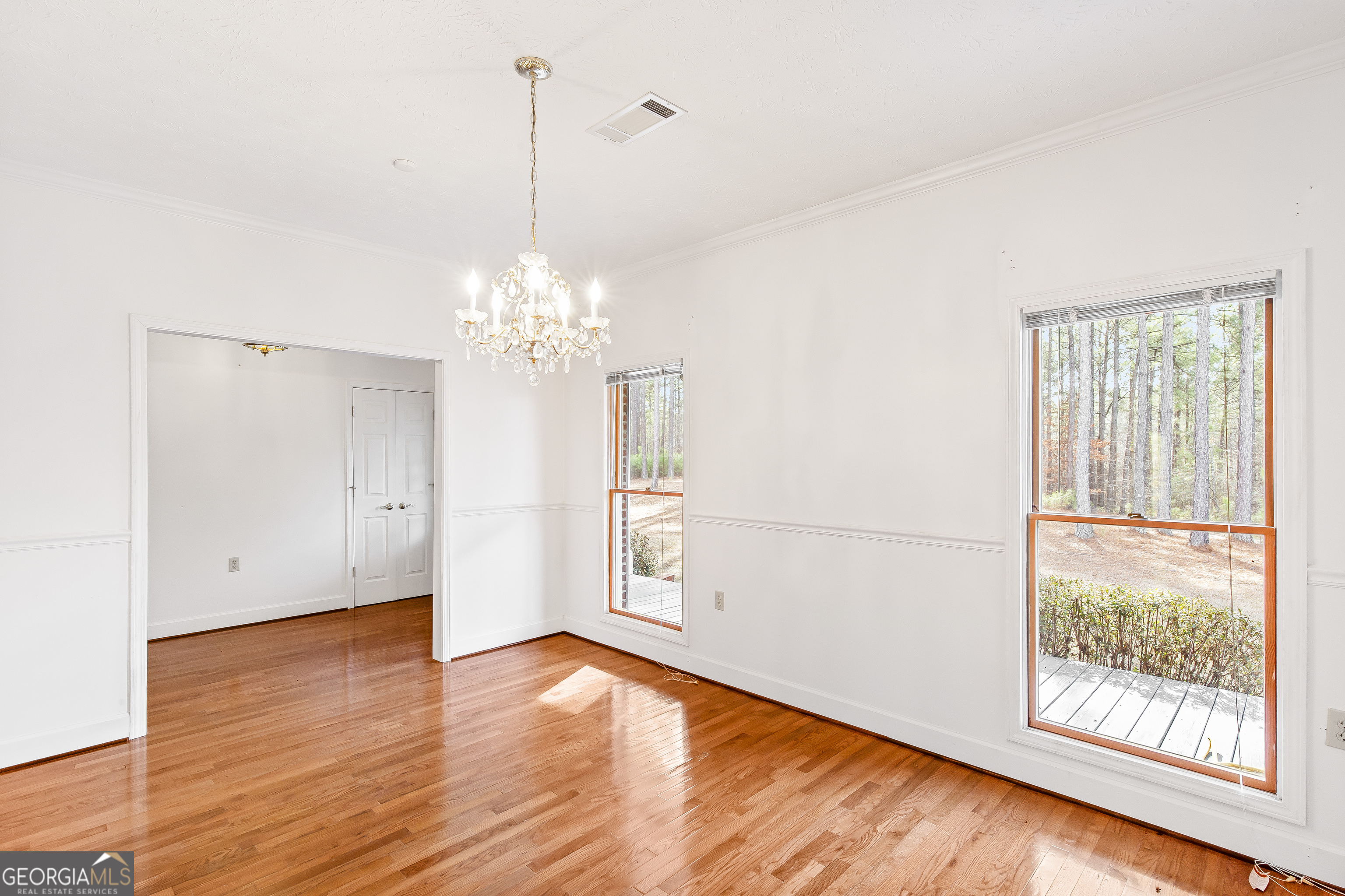 273 High Point Road Buchanan, GA 30113 - Photo 34 of 73 a view of a room with wooden floor and large window