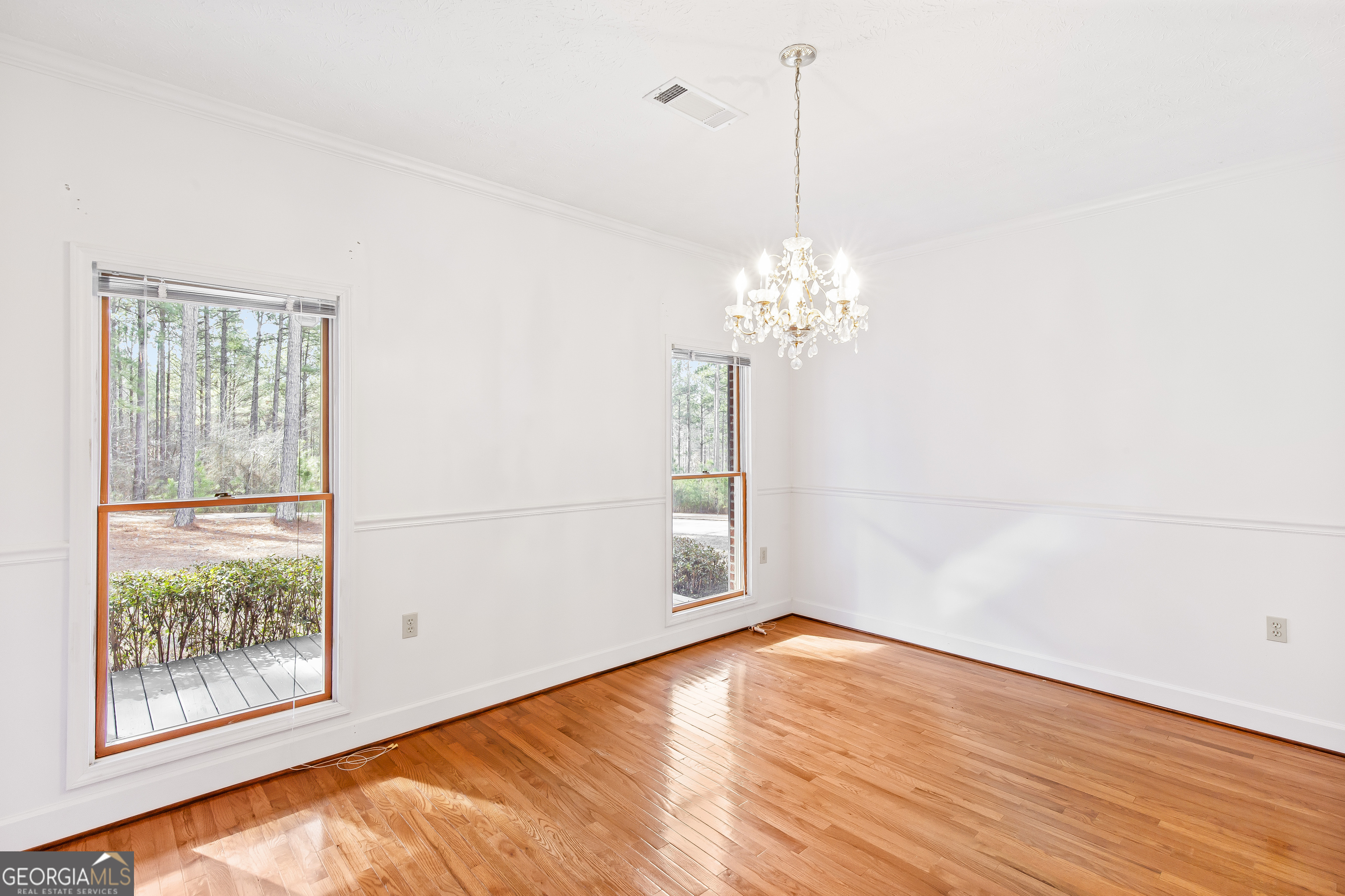 273 High Point Road Buchanan, GA 30113 - Photo 36 of 73 a view of empty room with wooden floor and fan