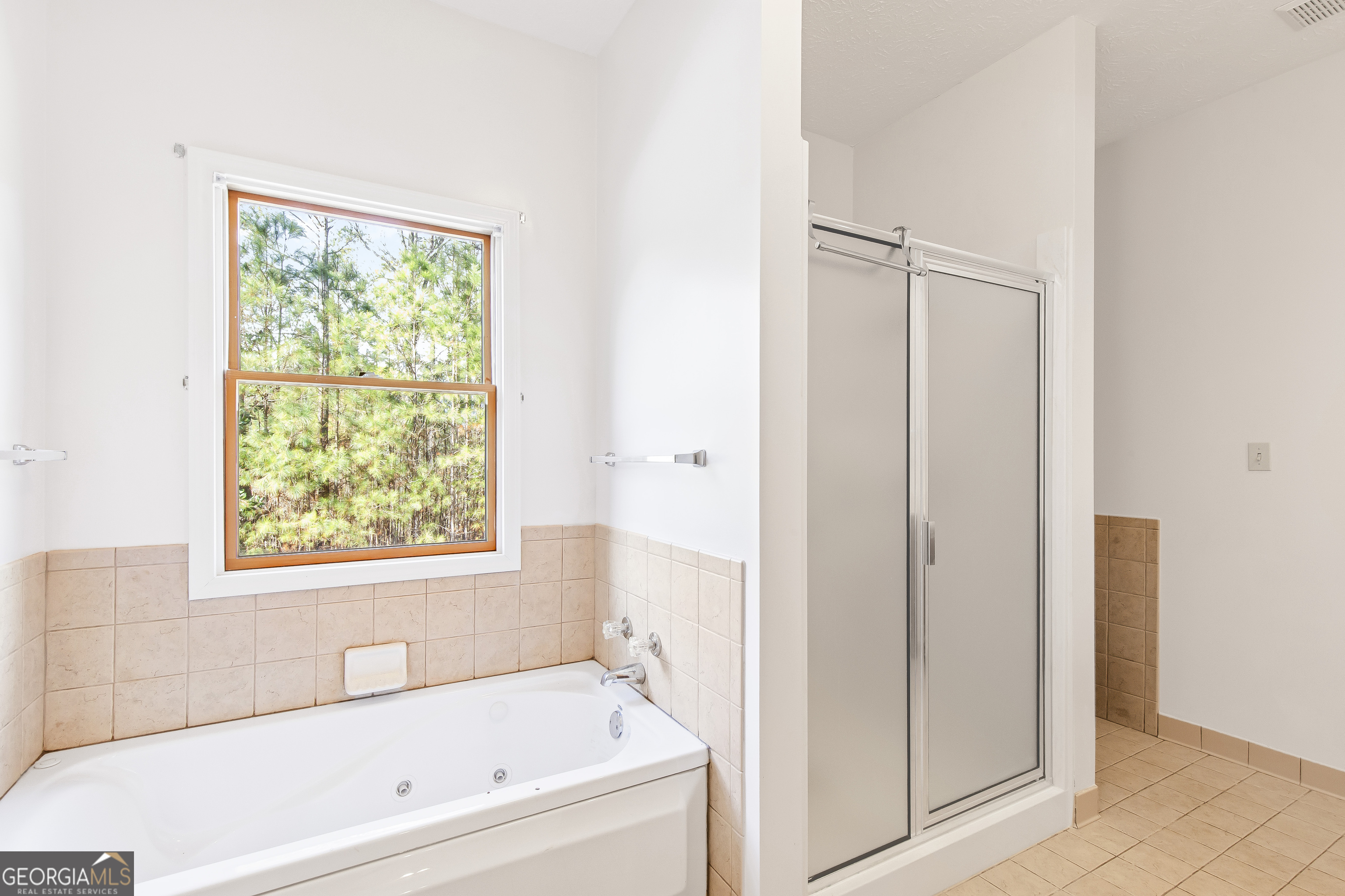 273 High Point Road Buchanan, GA 30113 - Photo 37 of 73 a white bath tub sitting next to a window