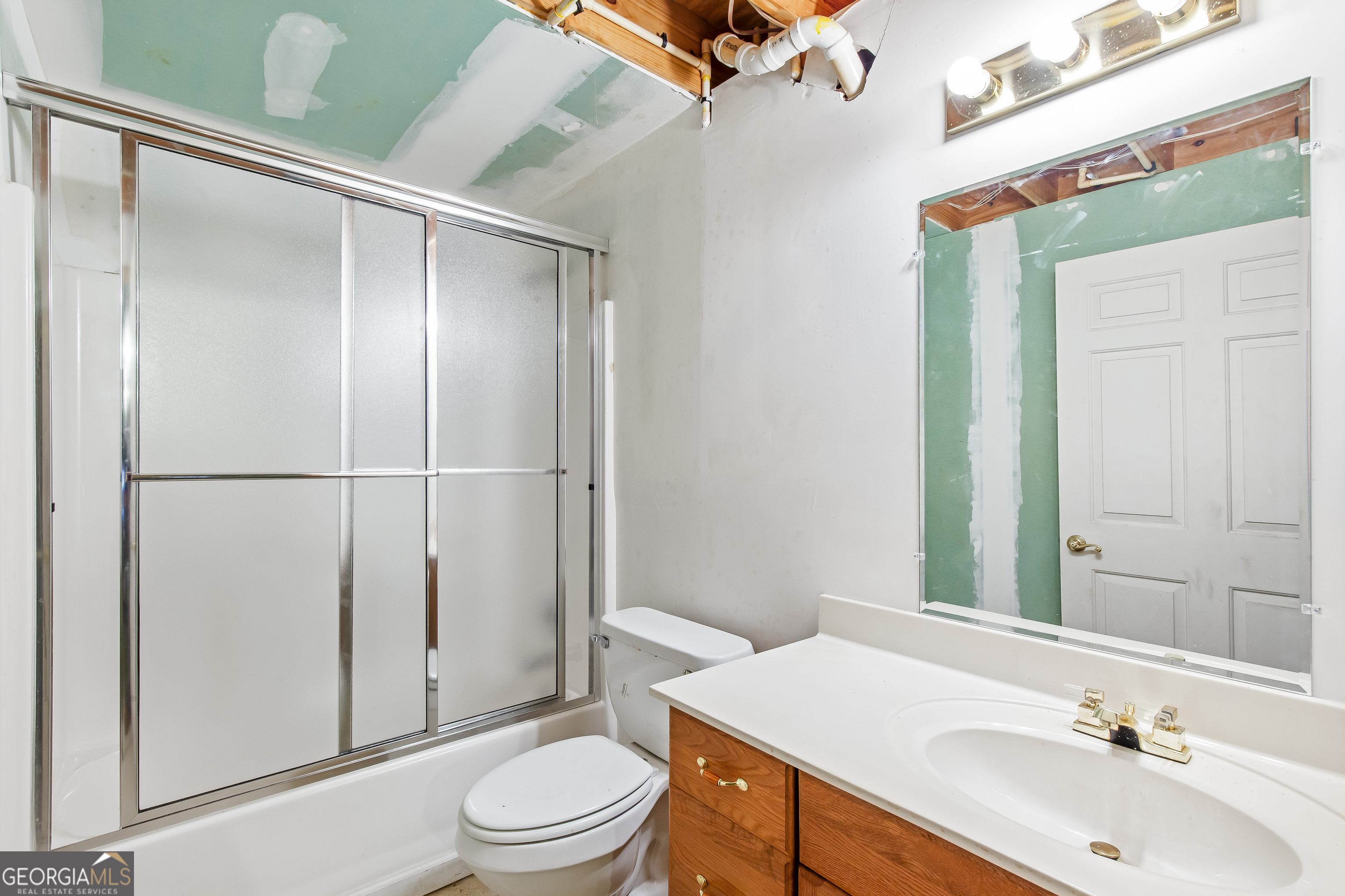 273 High Point Road Buchanan, GA 30113 - Photo 39 of 73 a bathroom with a sink toilet and shower