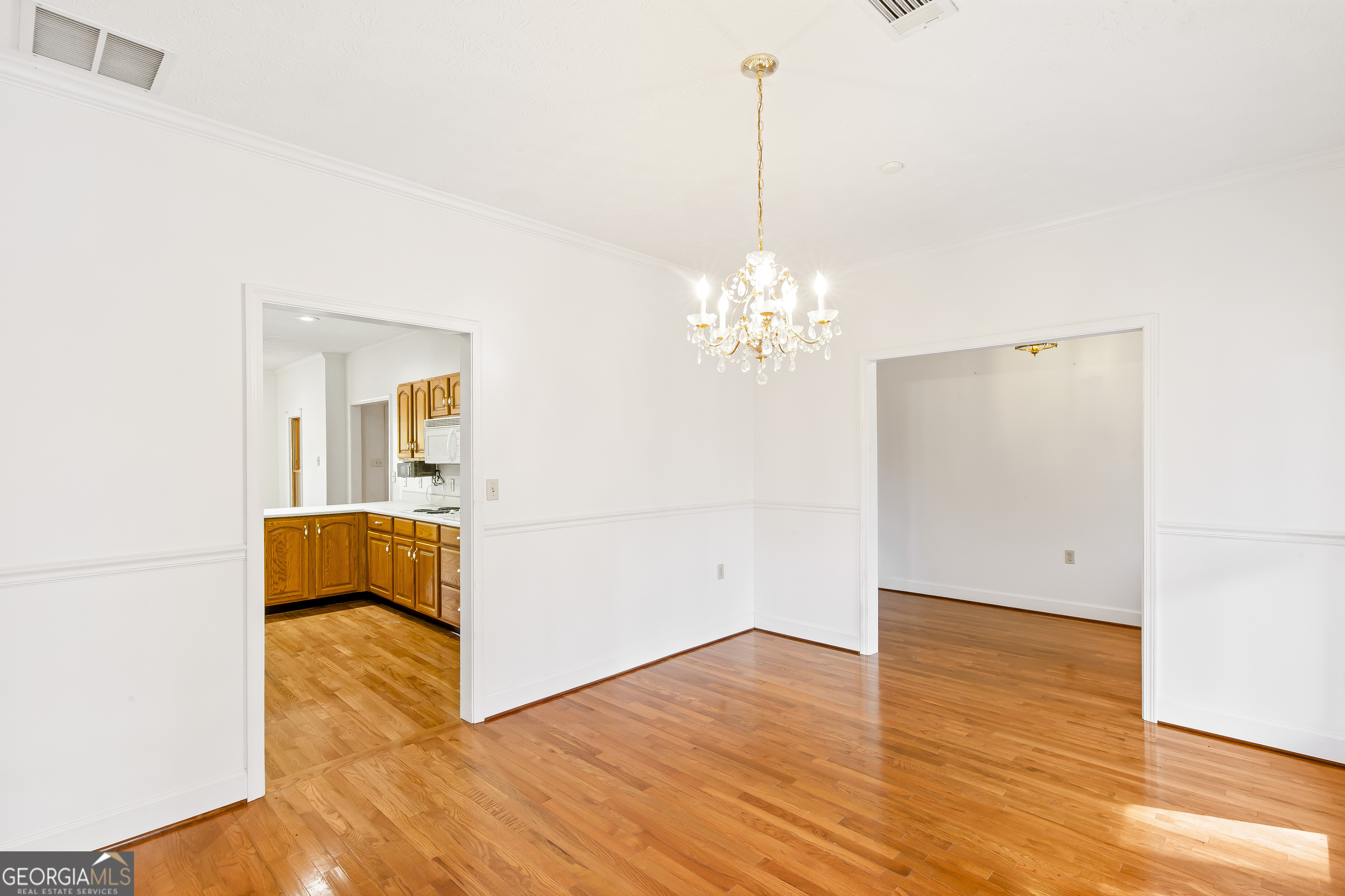 273 High Point Road Buchanan, GA 30113 - Photo 48 of 73 a view of a livingroom with a chandelier furniture and wooden floor
