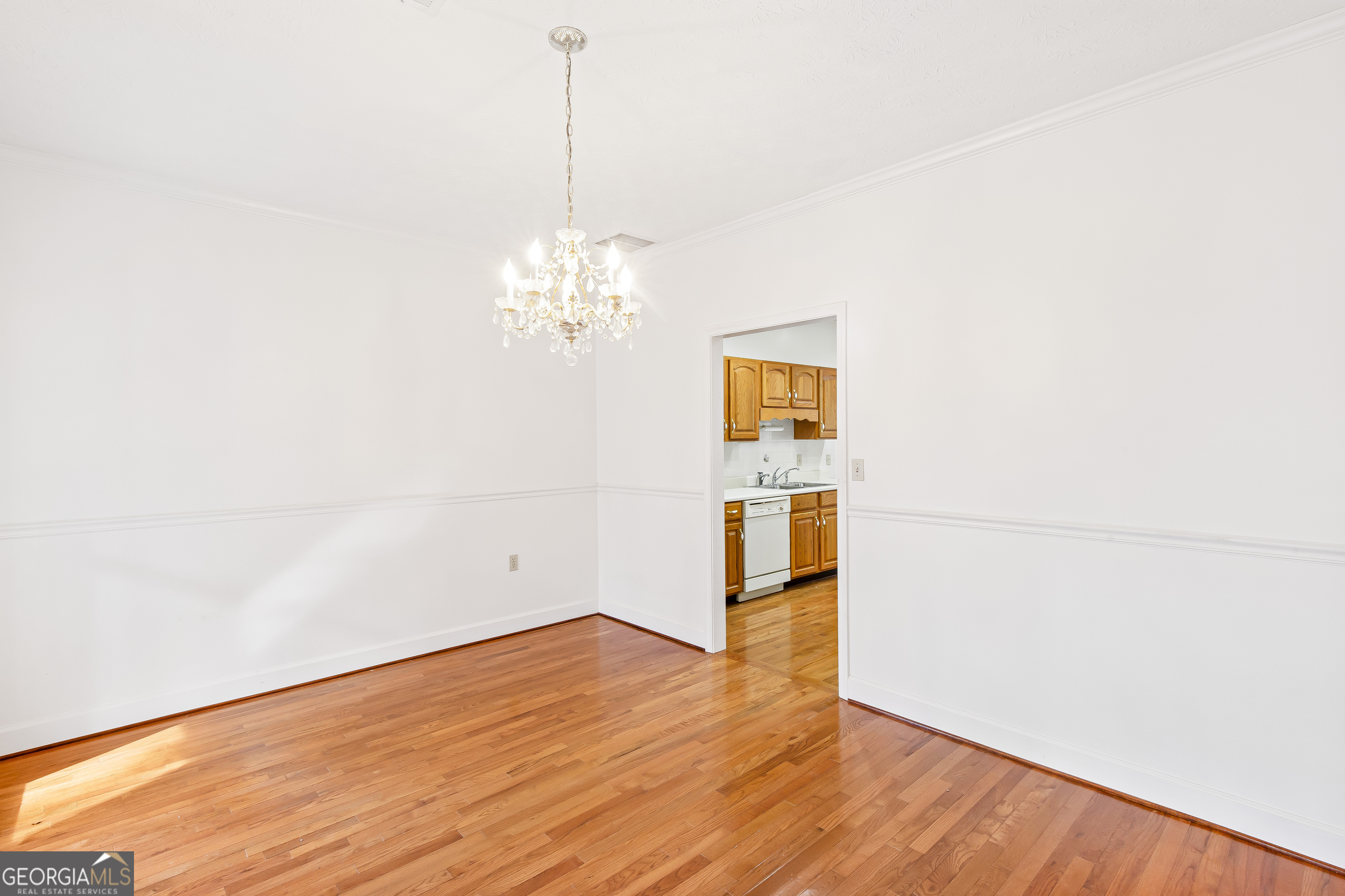 273 High Point Road Buchanan, GA 30113 - Photo 51 of 73 a view of a room with wooden floor and a ceiling fan