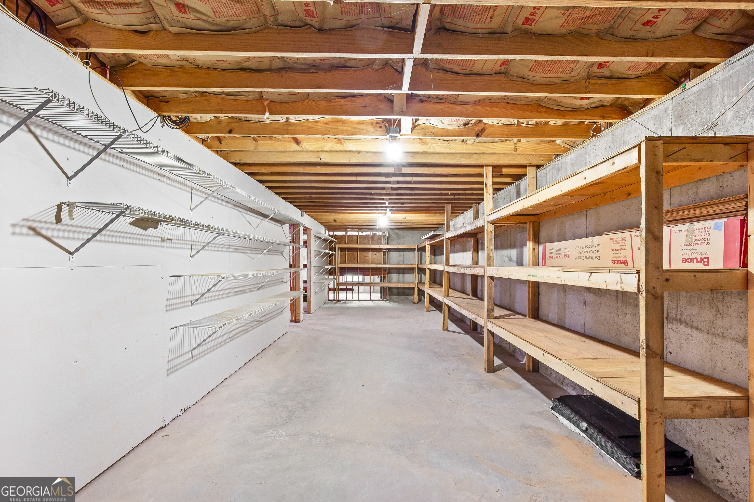 273 High Point Road Buchanan, GA 30113 - Photo 55 of 73 a view of an empty room with racks on the wall