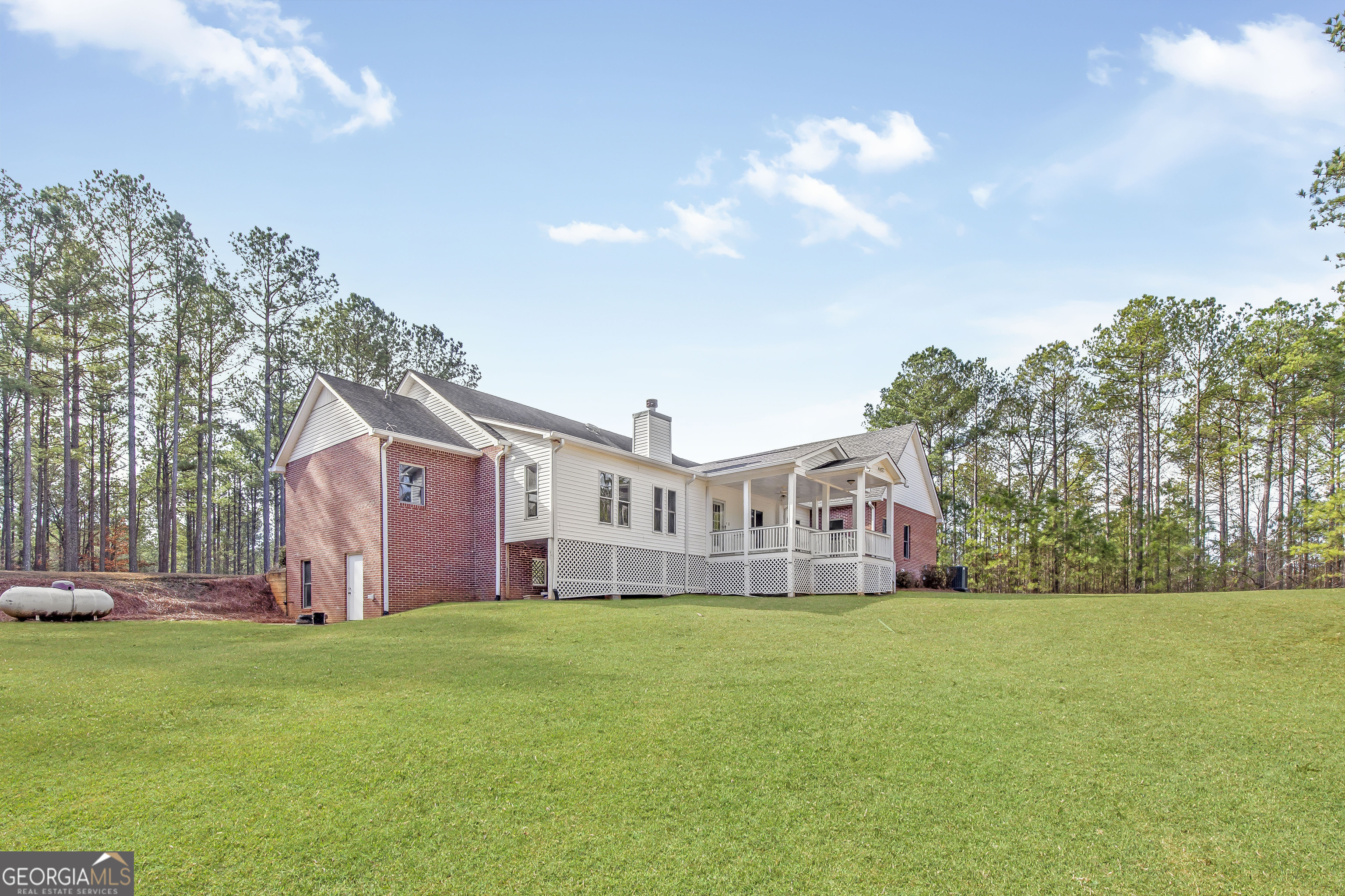 273 High Point Road Buchanan, GA 30113 - Photo 9 of 73 a view of a house with a big yard
