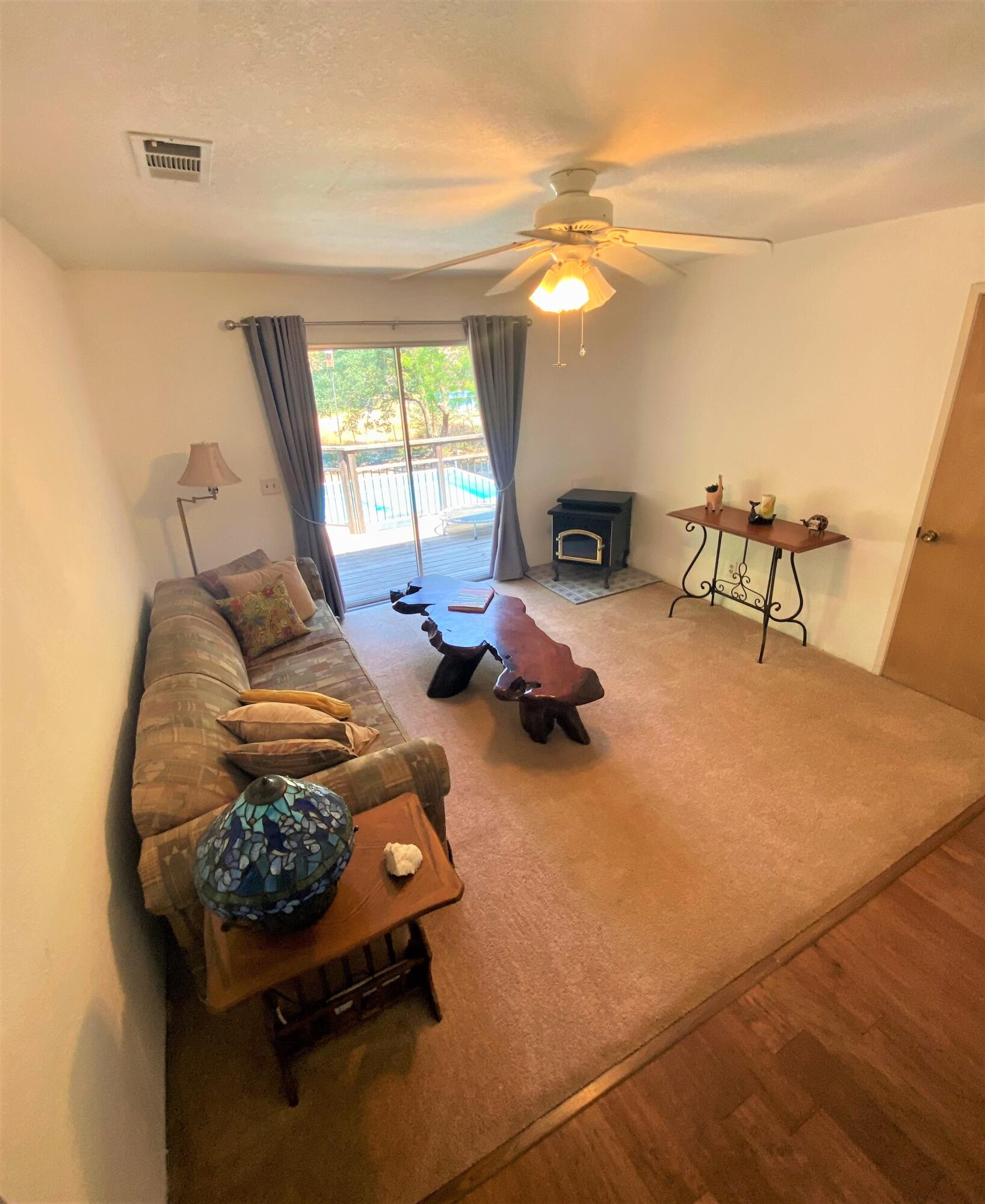 40968 Grouse Drive Three Rivers, CA 93271 - Photo 20 of 31 a bedroom with furniture and a chandelier