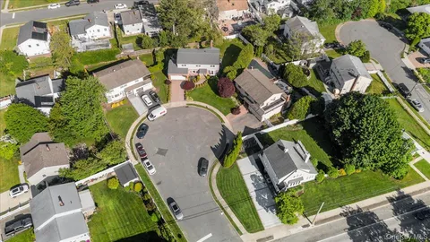 an aerial view of a swimming pool and outdoor space
