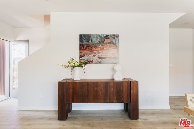 a view of balcony with furniture