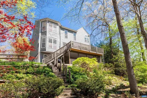 a bed room with a bed and a window