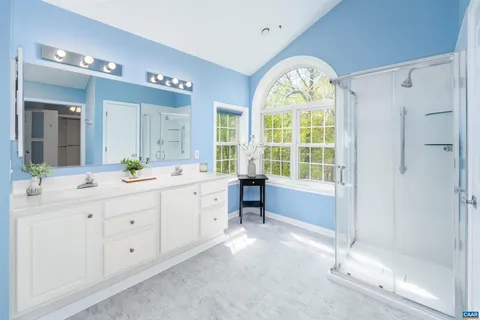 a bathroom with a sink toilet and a mirror