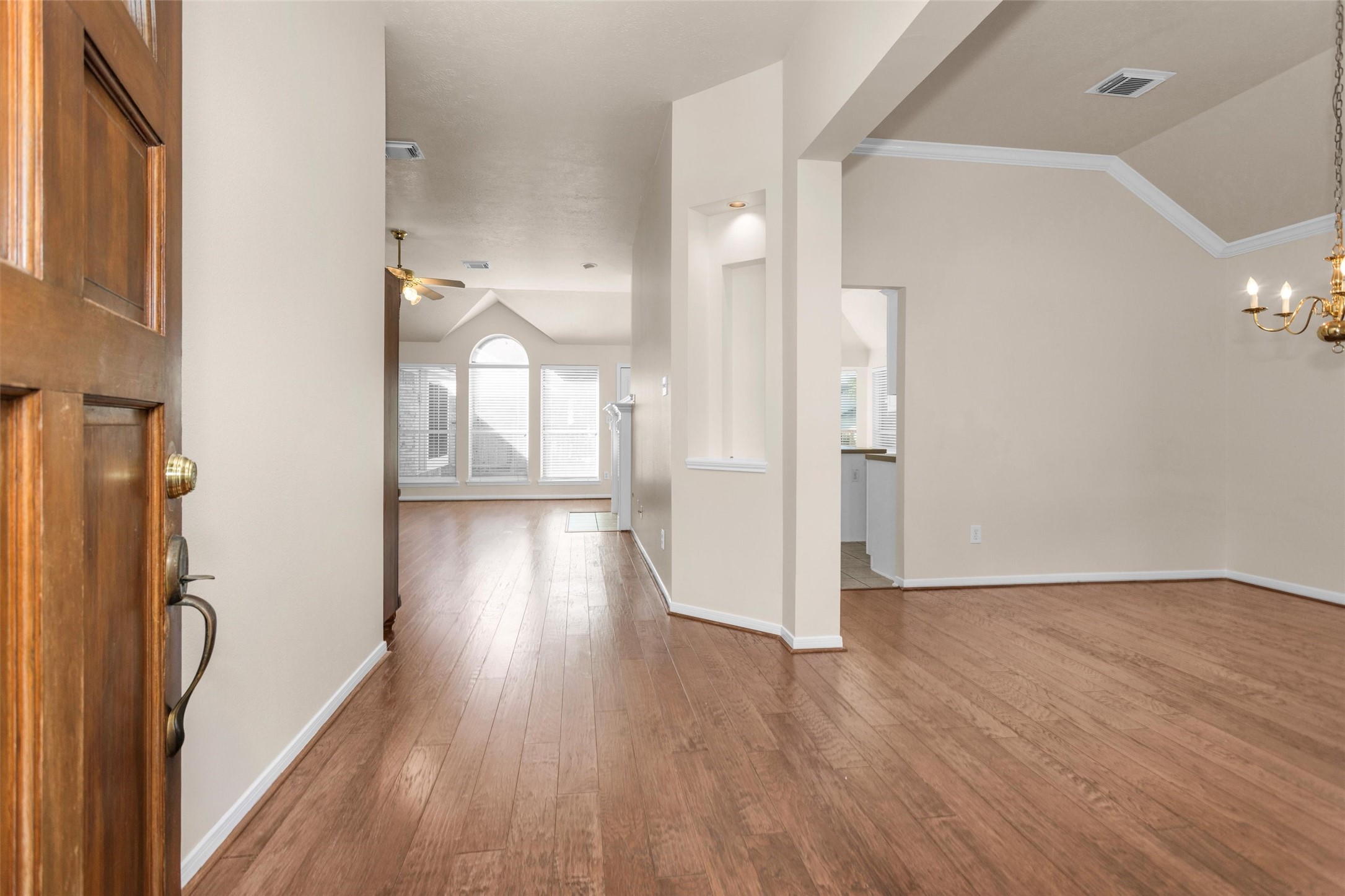 2615 Honeysuckle Walk Spring, TX 77388 - Photo 6 of 39 a view of entryway with wooden floor