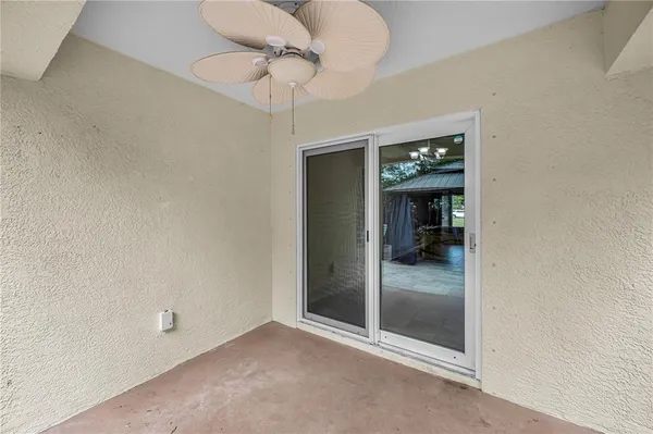 a front view of house with green space