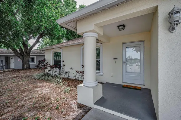 a bathroom with a sink vanity and a mirror