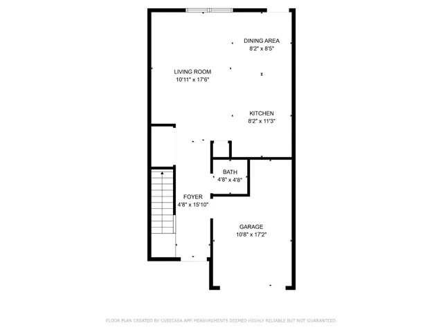 a picture of floor with a white wall and a painting