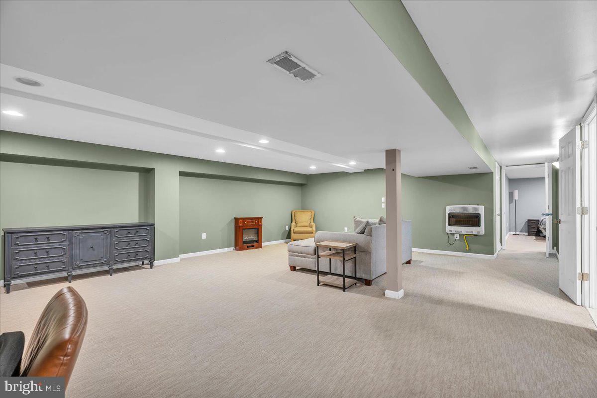 64 Blue Anchor Road Sicklerville, NJ 08081 - Photo 28 of 47 a view of a livingroom with furniture and a ceiling fan