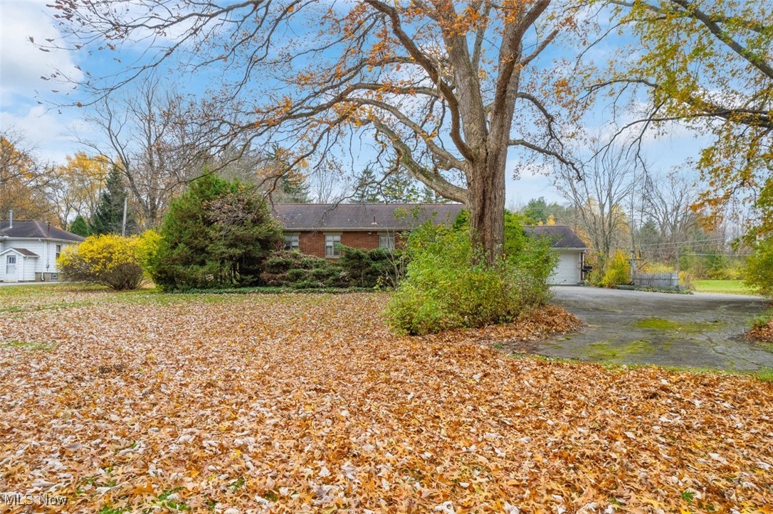 3265 Ridgewood Road Akron, OH 44333 - Photo 22 of 29 View of back of property with a garage