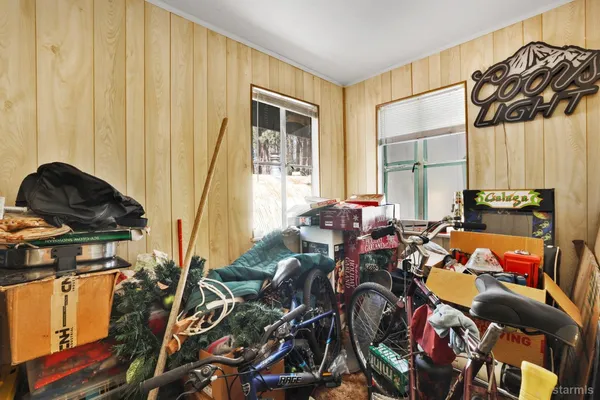 a view of a livingroom with furniture and toys