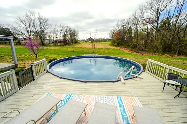 a bedroom with a bed and a desk