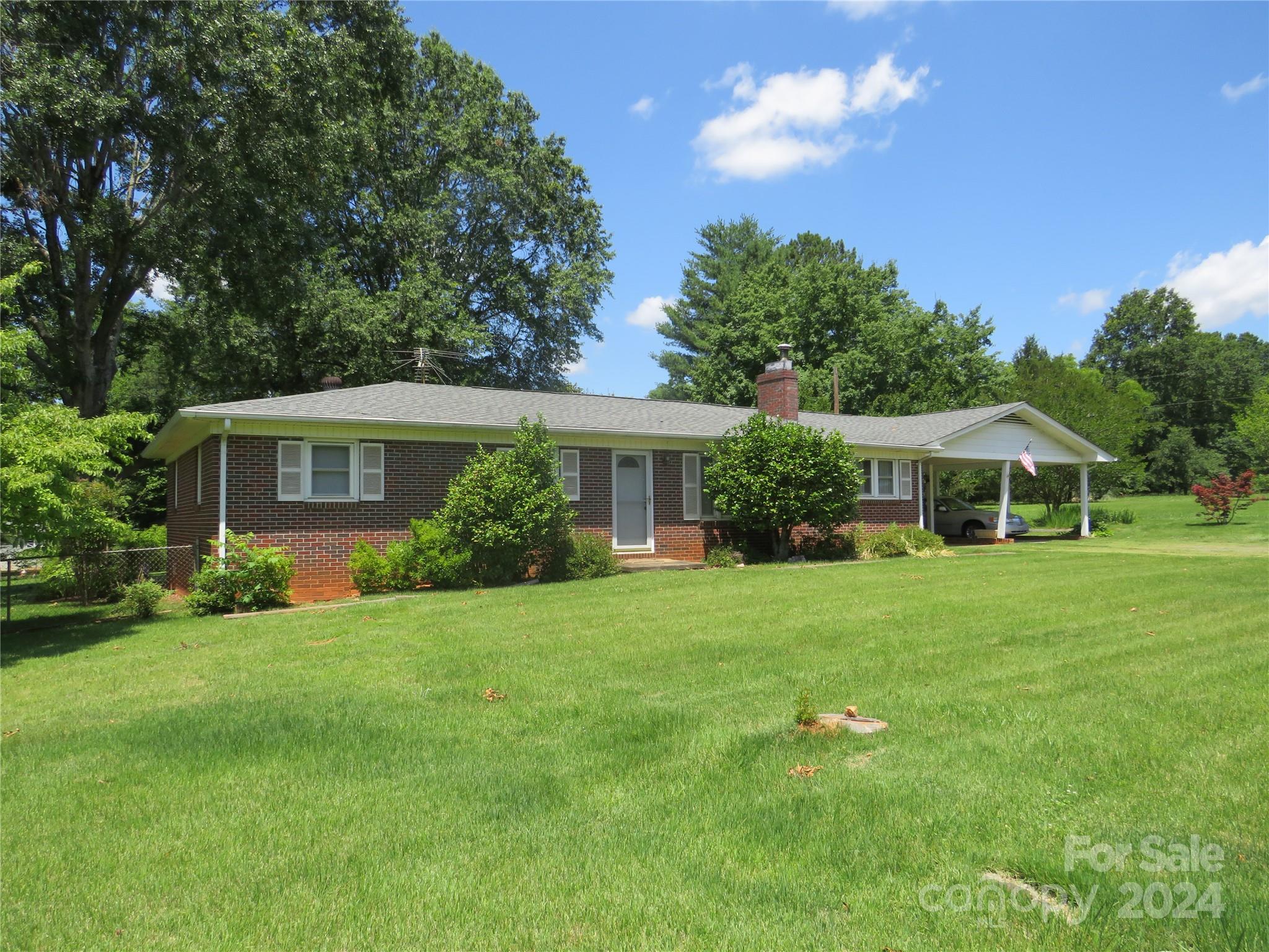 816 Poors Ford Road Rutherfordton, NC 28139 - Photo 11 of 23 a front view of a house with a garden