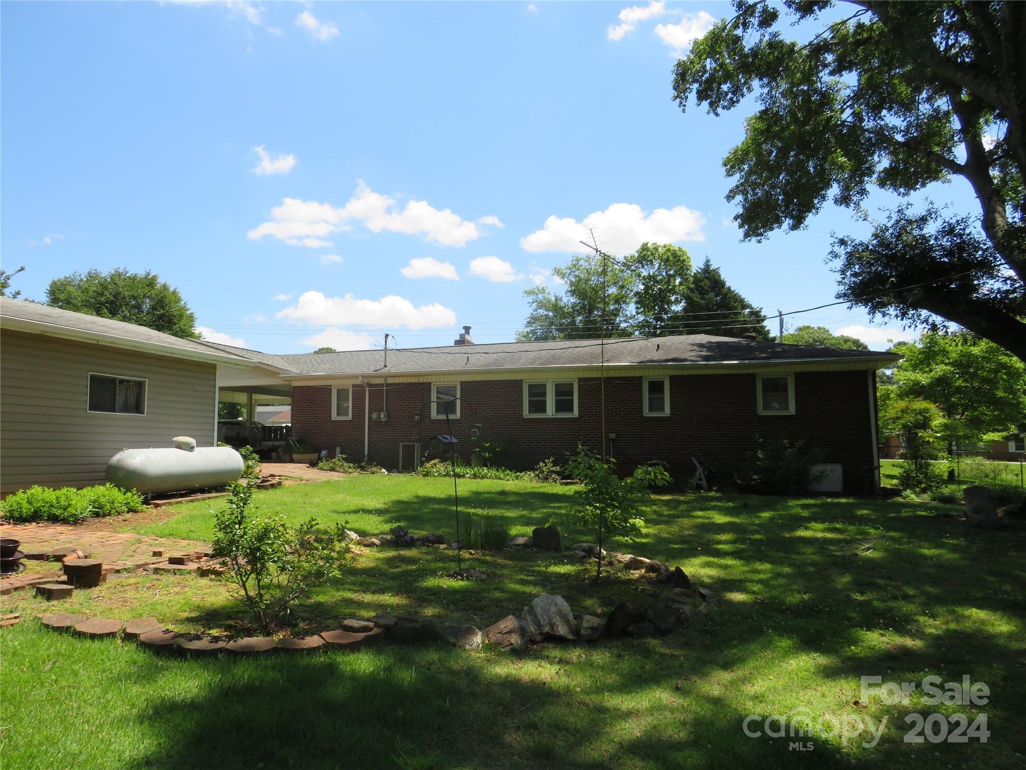 816 Poors Ford Road Rutherfordton, NC 28139 - Photo 3 of 23 a front view of house with yard and green space