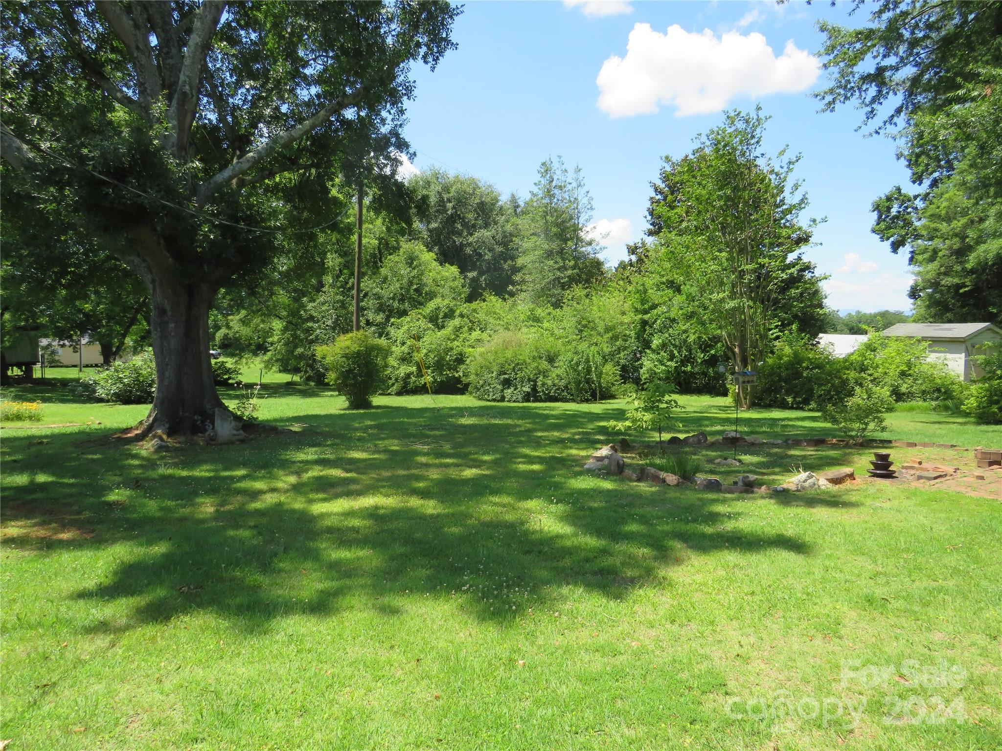 816 Poors Ford Road Rutherfordton, NC 28139 - Photo 9 of 23 a view of grassy field with benches