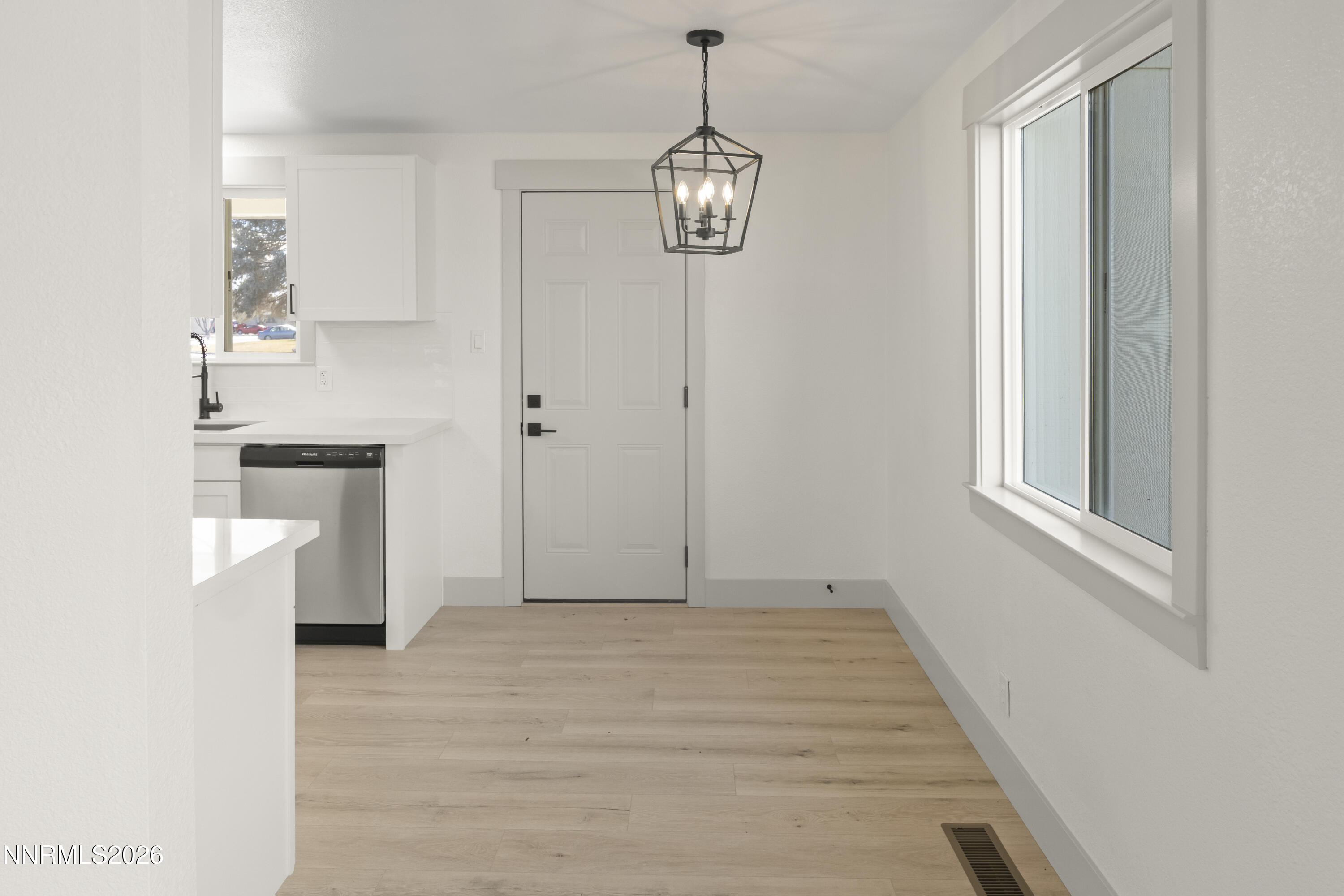 308 Shawna Way Yerington, NV 89447 - Photo 14 of 37 a view of an entryway with wooden floor
