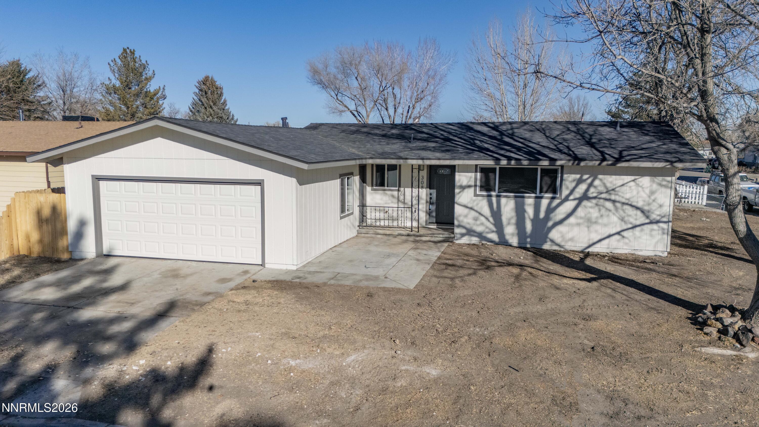 308 Shawna Way Yerington, NV 89447 - Photo 2 of 37 a house with a outdoor space