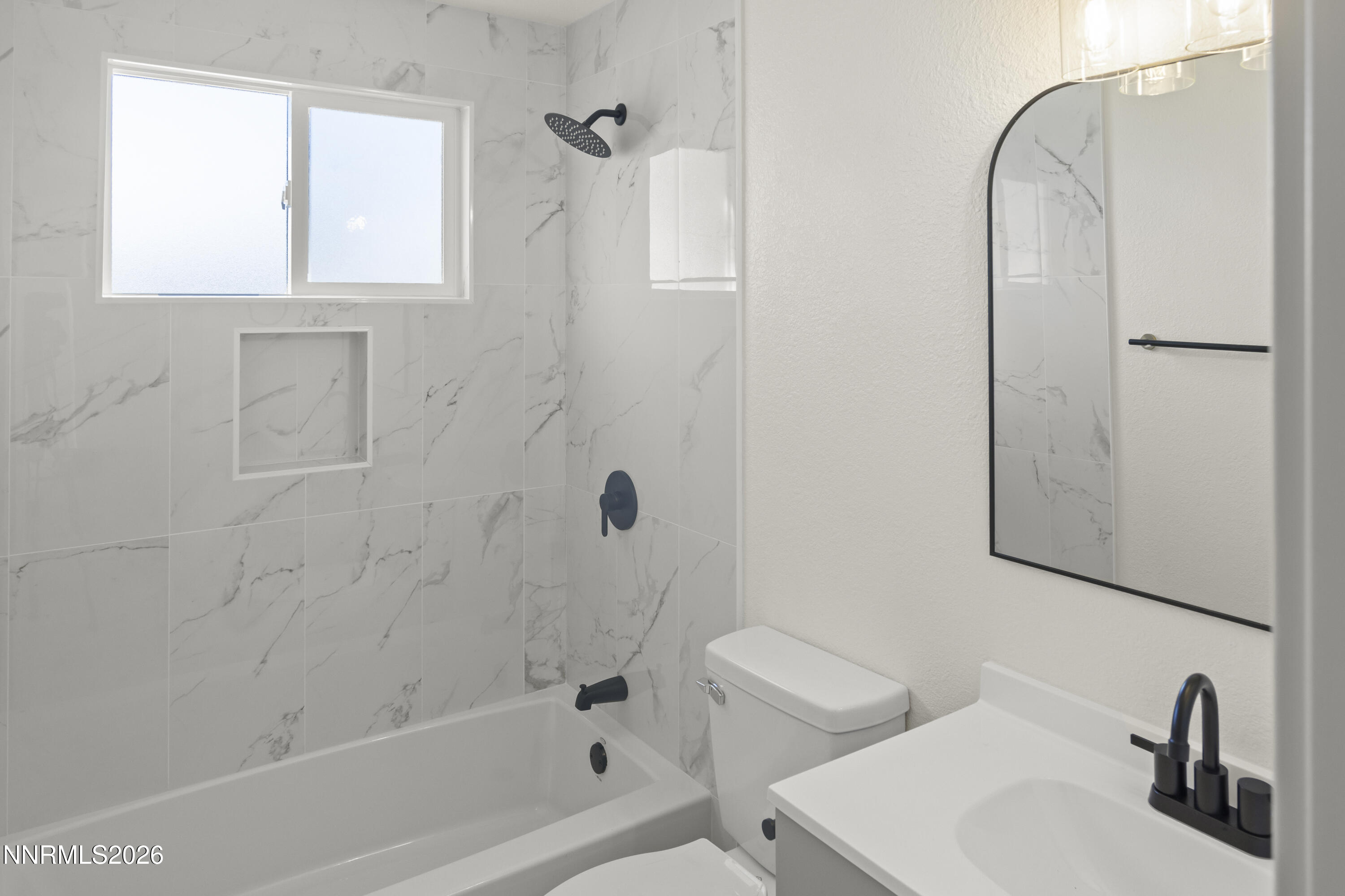 308 Shawna Way Yerington, NV 89447 - Photo 27 of 37 a bathroom with a sink a toilet and shower