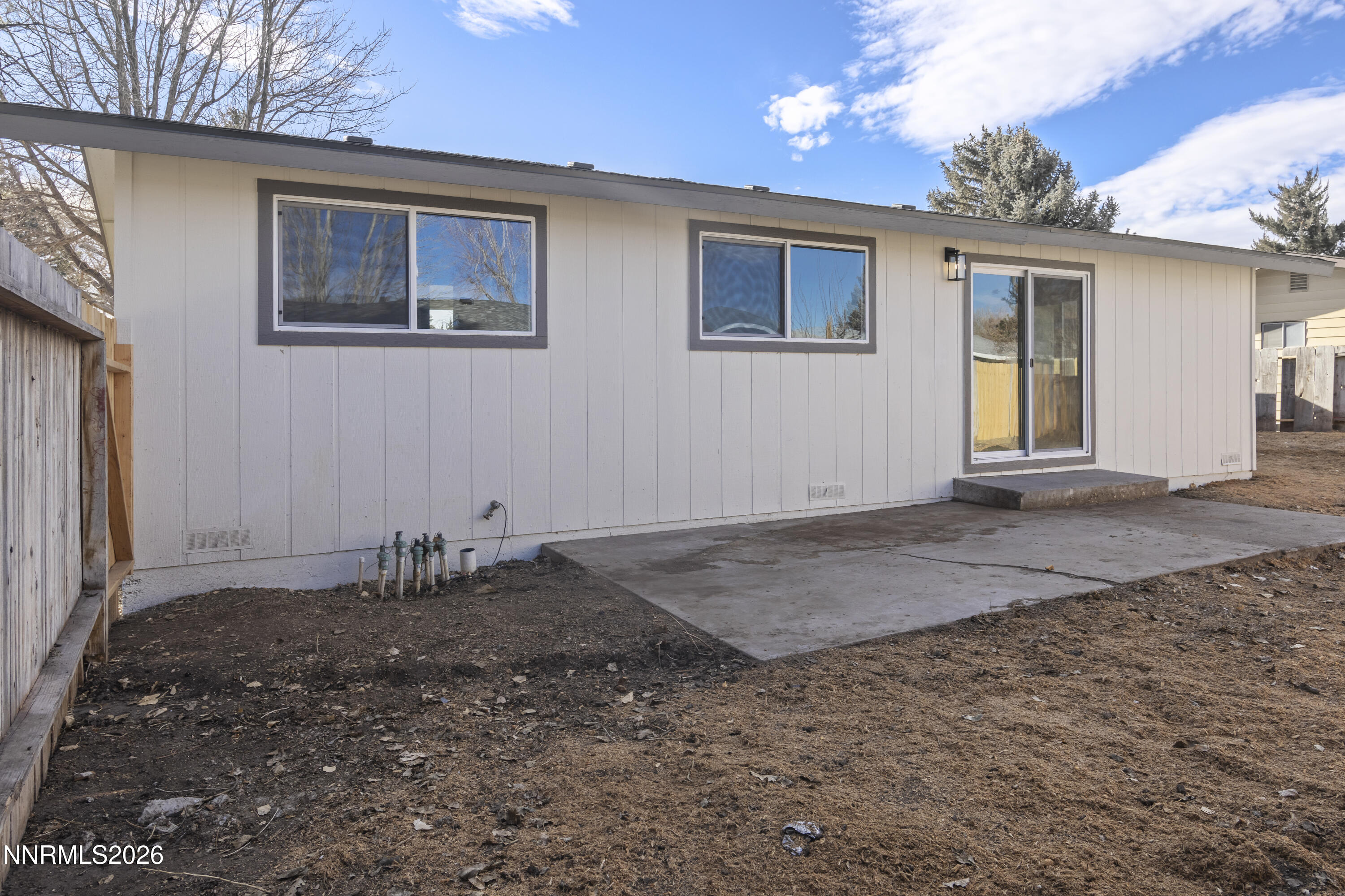 308 Shawna Way Yerington, NV 89447 - Photo 32 of 37 a view of a house with a backyard