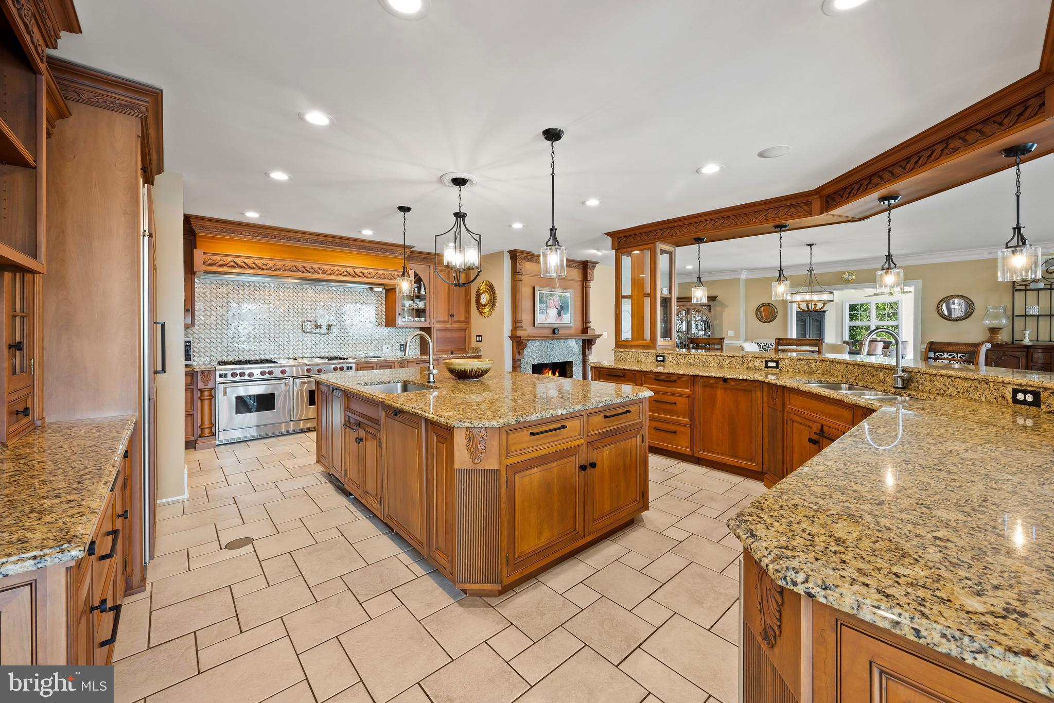 125 South Winchester Road Annapolis, MD 21409 - Photo 12 of 47 a large kitchen with stainless steel appliances granite countertop a large counter top and a stove