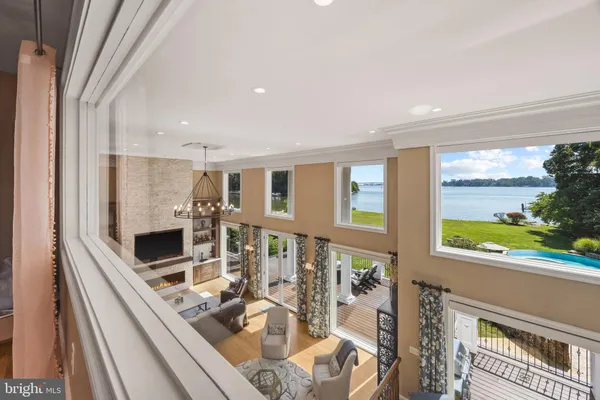 a view of a living room and a floor to ceiling window