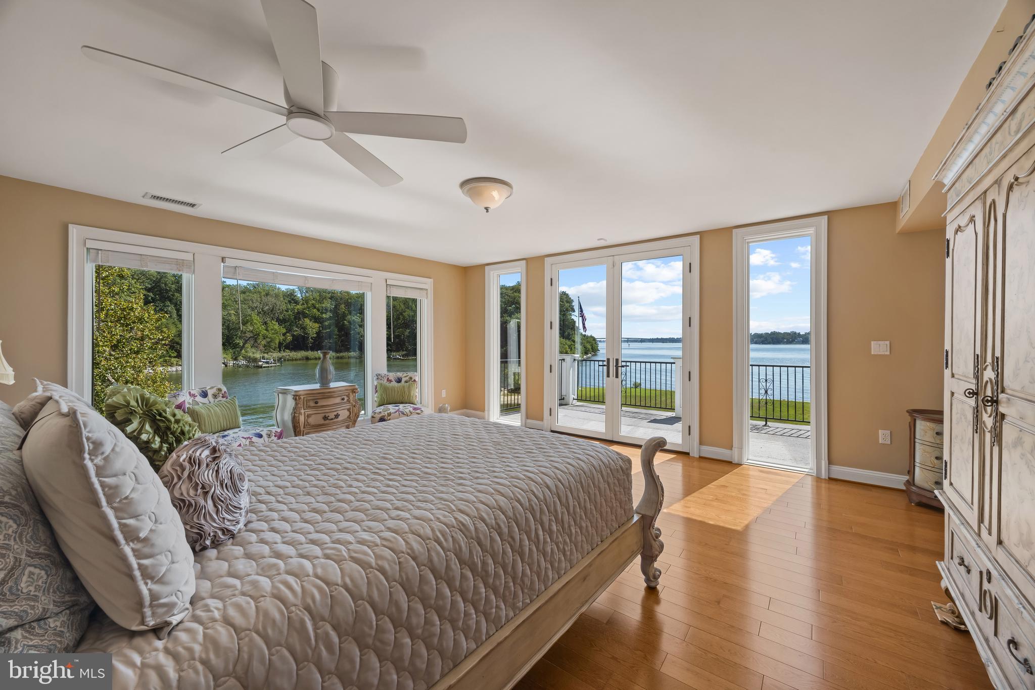 125 South Winchester Road Annapolis, MD 21409 - Photo 27 of 47 a large bedroom with a large bed and wooden floor