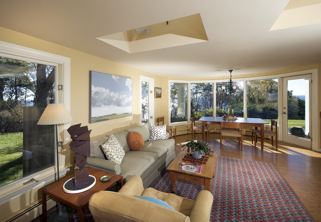 301 Summer Street Manchester, MA 01944 - Photo 12 of 22 a living room with furniture and a large window