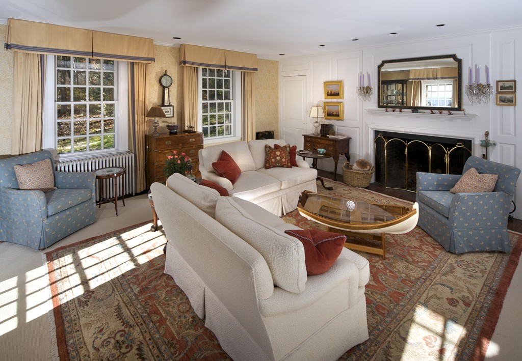 301 Summer Street Manchester, MA 01944 - Photo 15 of 22 a living room with furniture potted plant and a fireplace