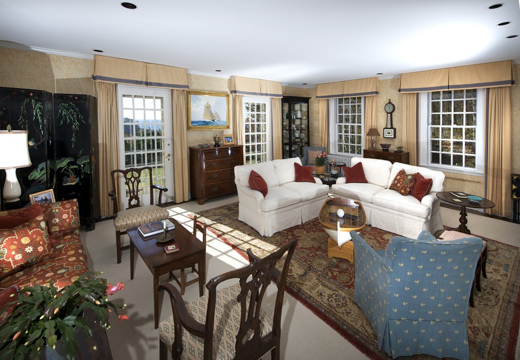 301 Summer Street Manchester, MA 01944 - Photo 16 of 22 a living room with furniture and a floor to ceiling window