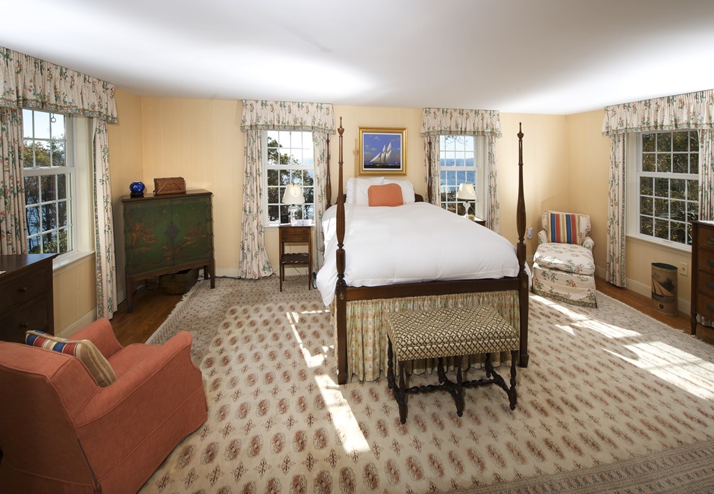 301 Summer Street Manchester, MA 01944 - Photo 17 of 22 a bed room with a bed and wooden floor