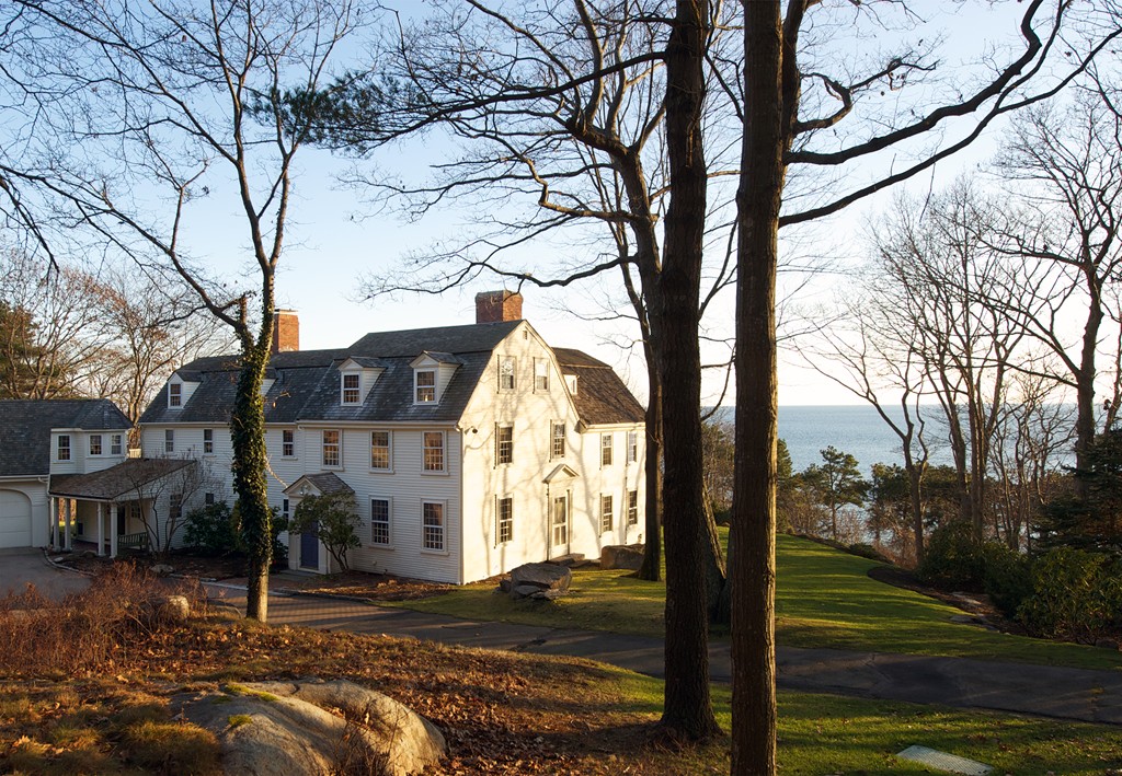 301 Summer Street Manchester, MA 01944 - Photo 4 of 22 a view of a street with a tree in the background