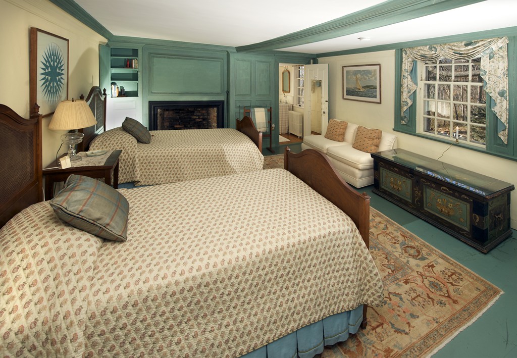 301 Summer Street Manchester, MA 01944 - Photo 9 of 22 a bedroom with a bed a dresser next to a window