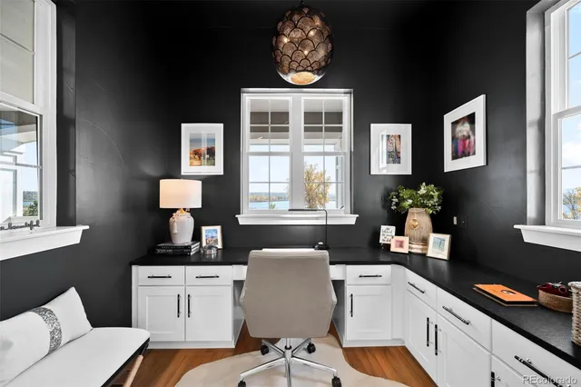 a kitchen with a sink cabinets and window