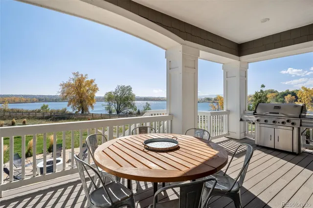 a view of a patio with a table chairs and a table
