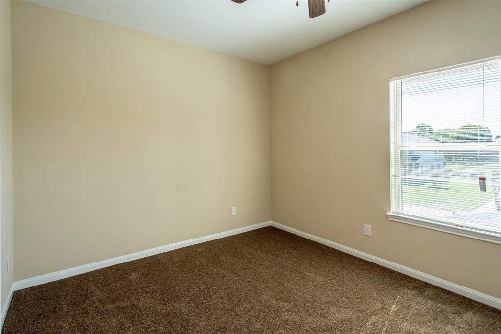 8142 Cabot Street, Unit A Houston, TX 77078 - Photo 14 of 21 an empty room with a window