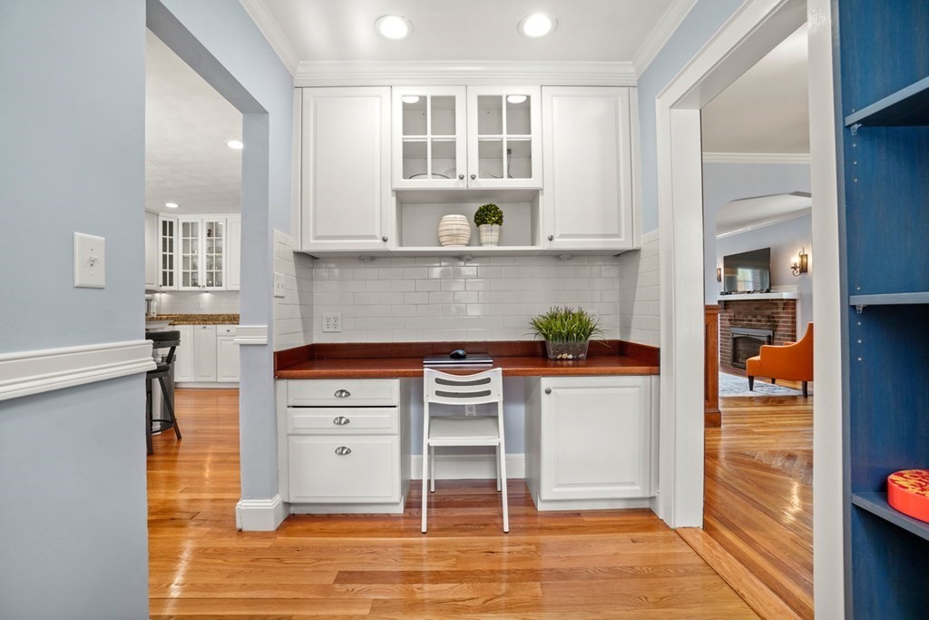 1147 Brook Road Milton, MA 02186 - Photo 13 of 31 a kitchen with cabinets and wooden floor