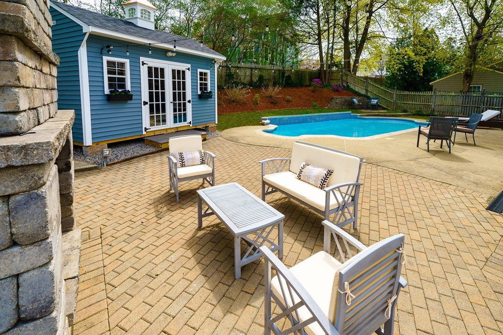 1147 Brook Road Milton, MA 02186 - Photo 30 of 31 a view of a patio with chairs and a table