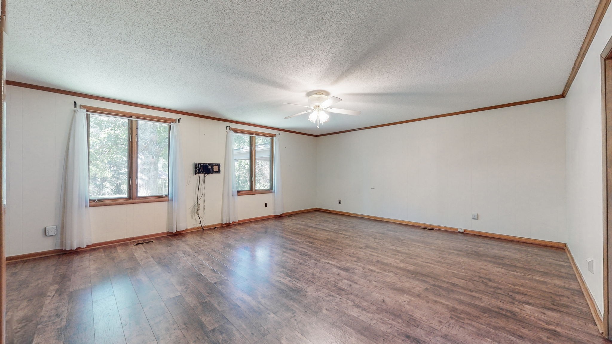 6714 Lee Road Smyrna, TN 37167 - Photo 23 of 70 a view of empty room with wooden floor and fan