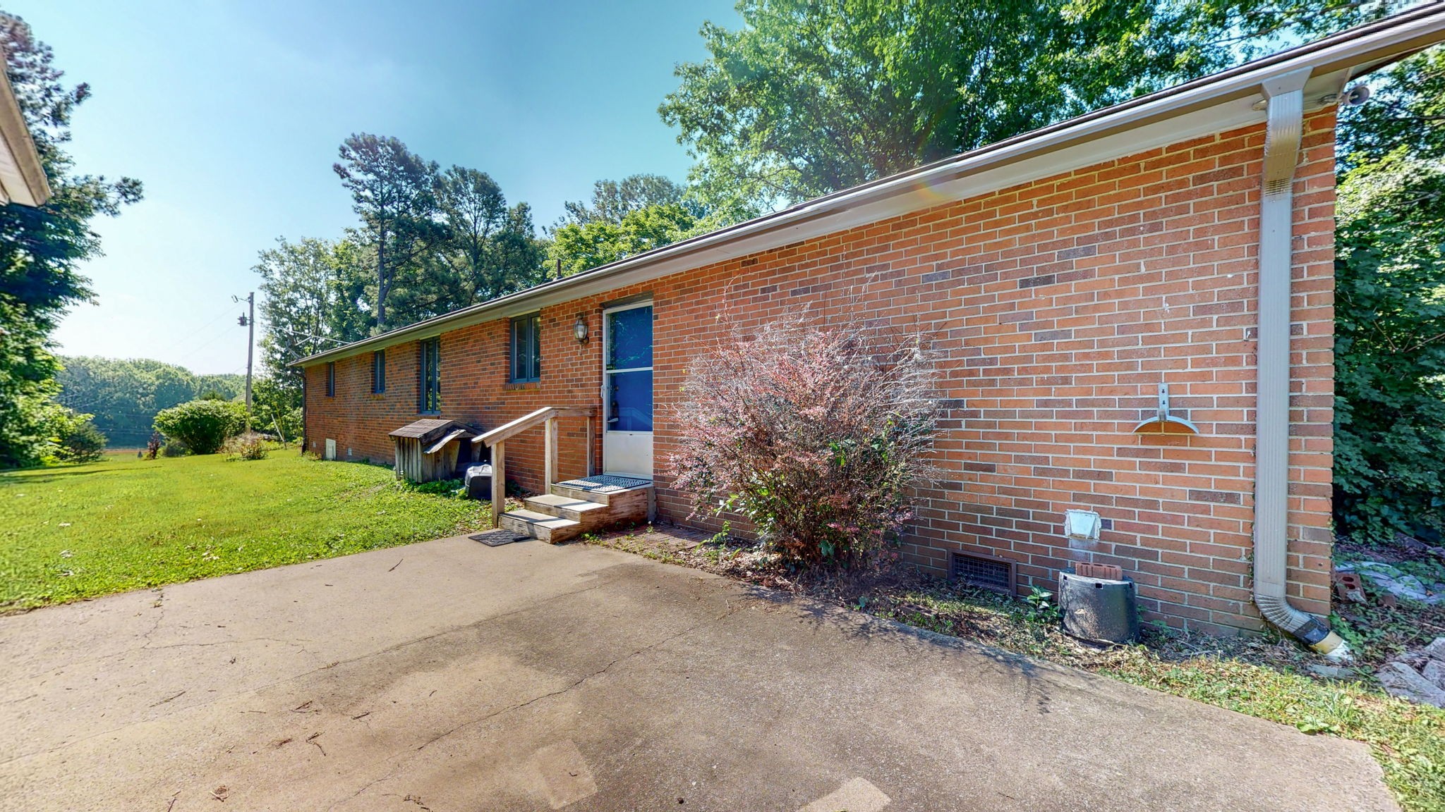 6714 Lee Road Smyrna, TN 37167 - Photo 47 of 70 a wooden bench sitting in front of a house