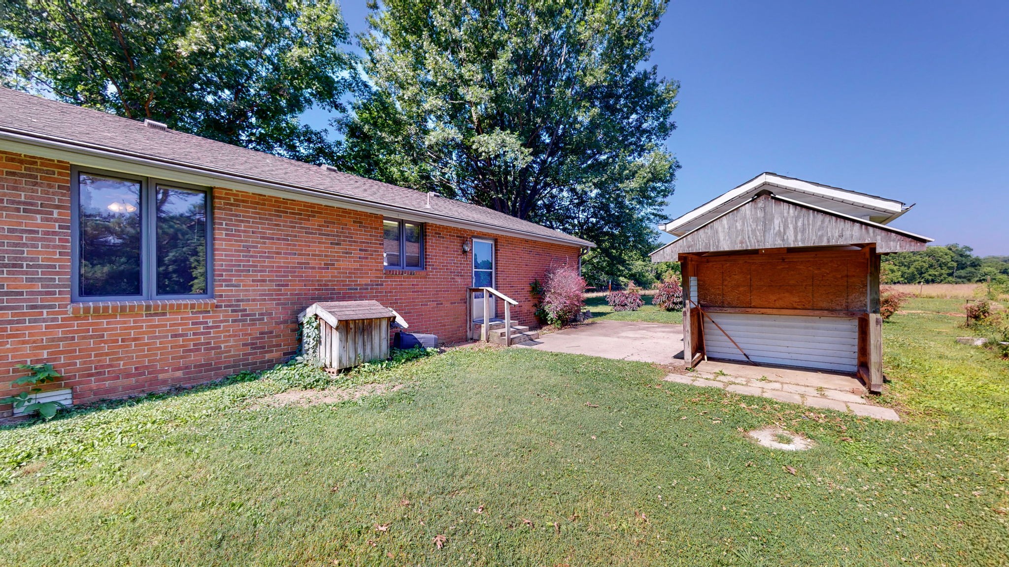 6714 Lee Road Smyrna, TN 37167 - Photo 48 of 70 a backyard of a house with table and chairs