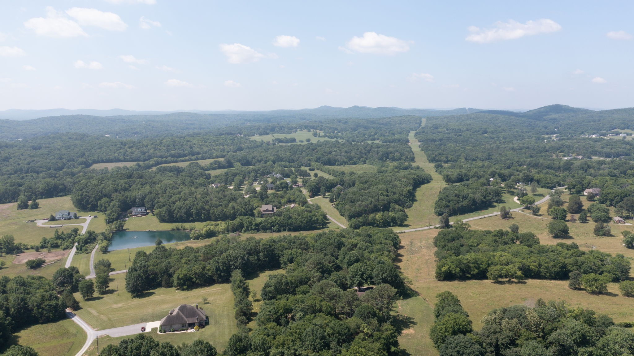 6714 Lee Road Smyrna, TN 37167 - Photo 66 of 70 an aerial view of a house with mountain view